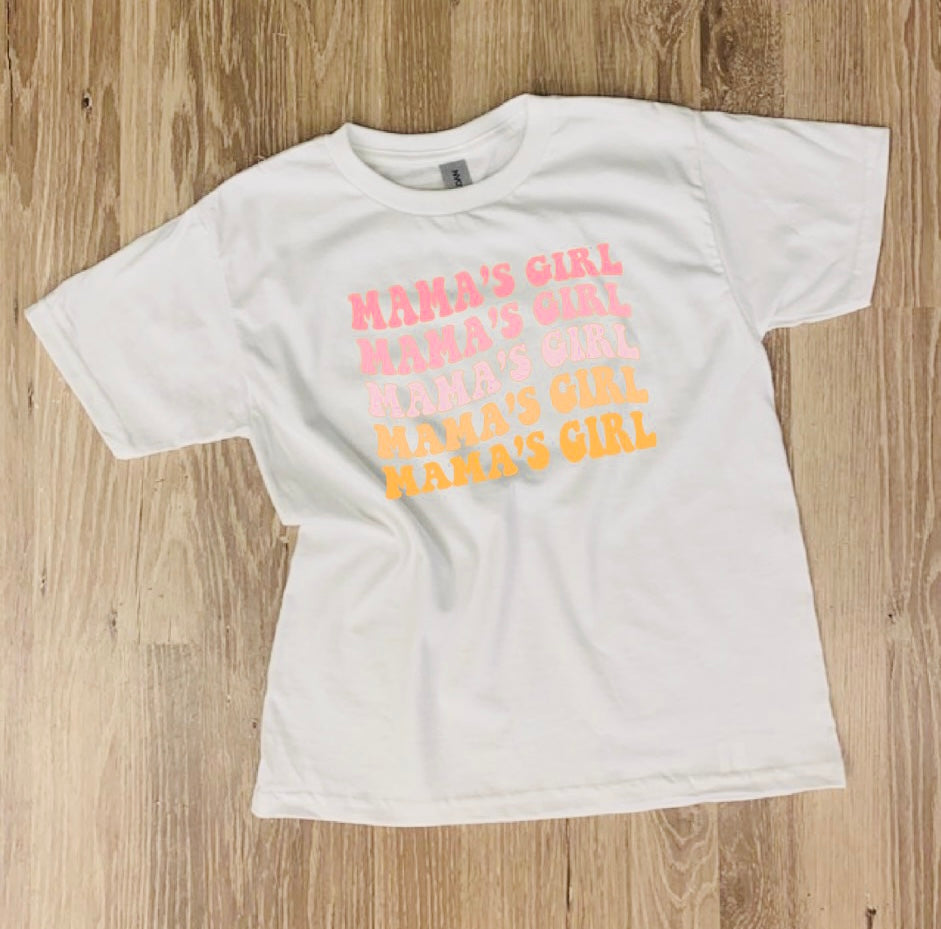 Living that retro, nostalgic life? Look no further than Mama's Girl Graphic Tee! This bright and colorful tee boasts eye-catching orange and pink hues. And the best part? You'll be representing the ultimate baddie: Mama! So get ready to rock it and rock it hard. Booyah!