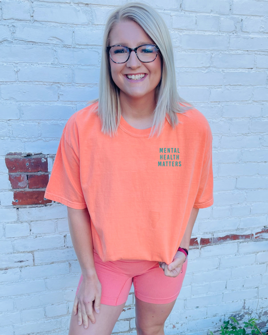 This Mental Health Matters graphic tee by Comfort Colors is a perfect way to make a statement in style. Featuring vibrant colors and a blue design, this tee is sure to stand out. It has an oversized fit for maximum comfort. Show your support with this must-have statement piece!